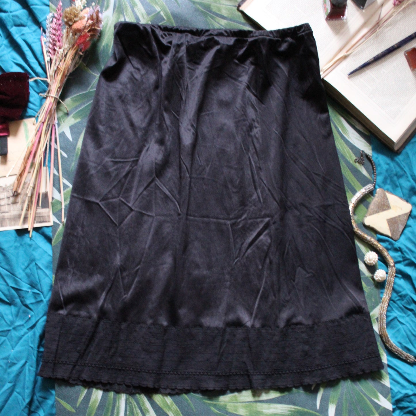 Classic black half slip with woven trim