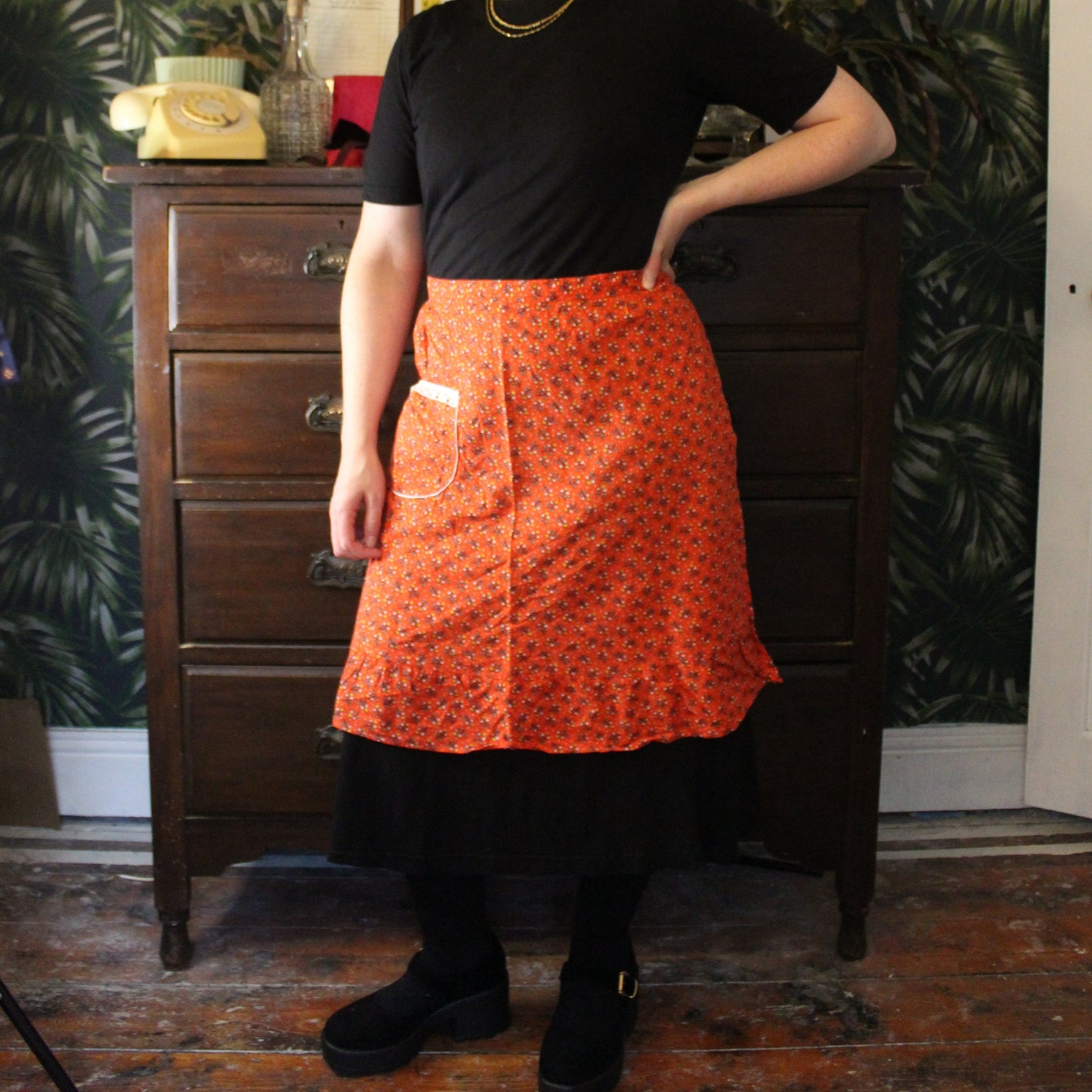 Ruby red half apron with floral print