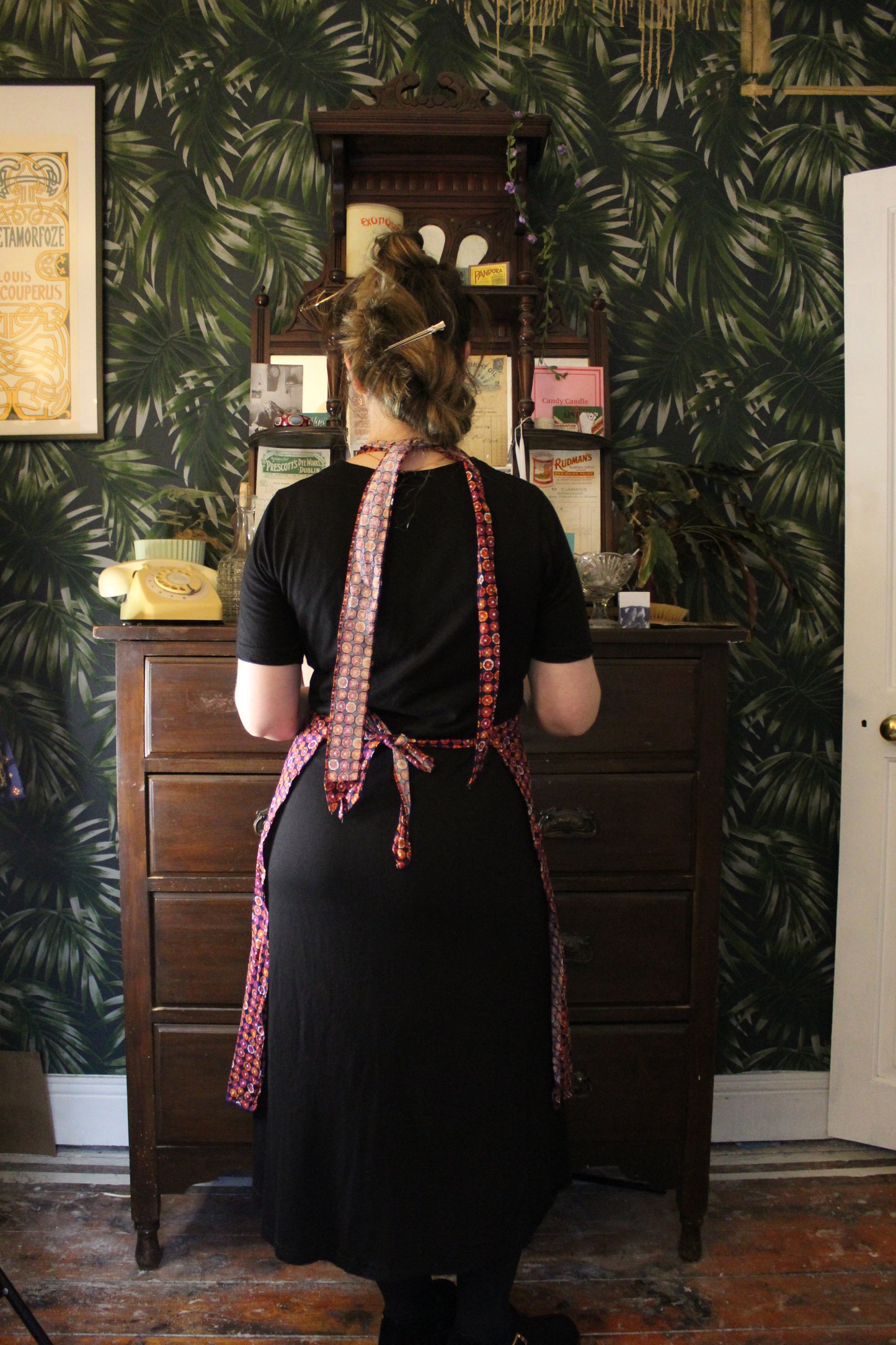 Navy apron with pinky orange floral prints