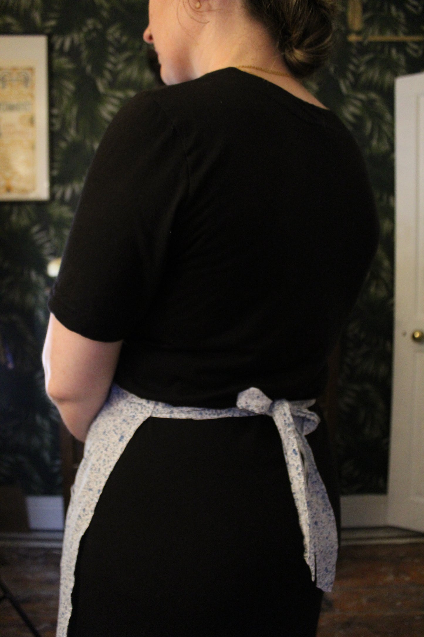 Prairie style white half apron with blue florals
