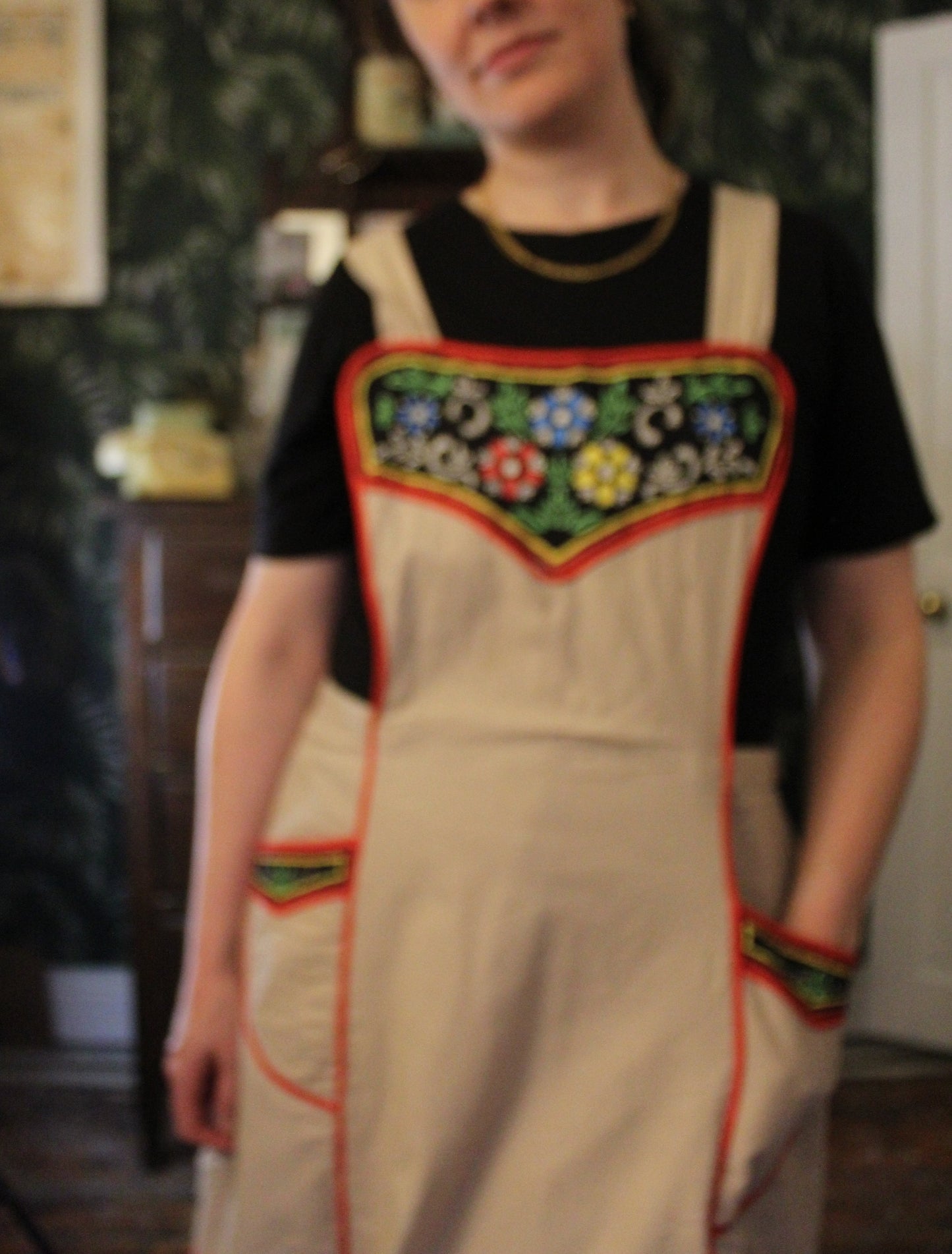 Canvas apron with black floral panels