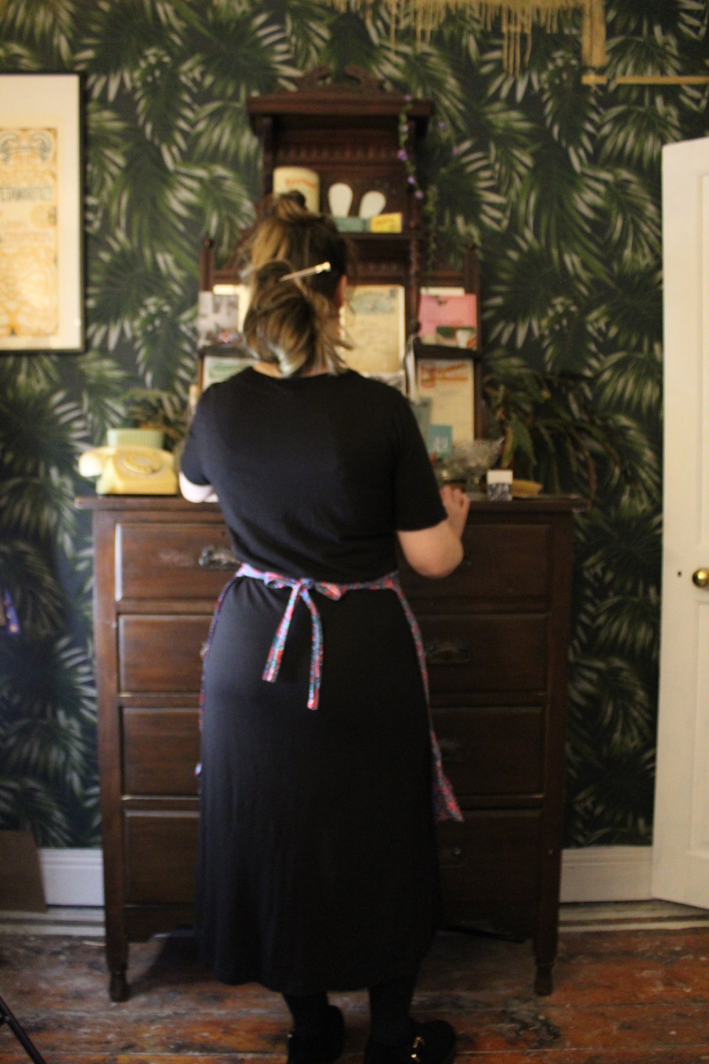 Electric half apron with pink and green geometric print