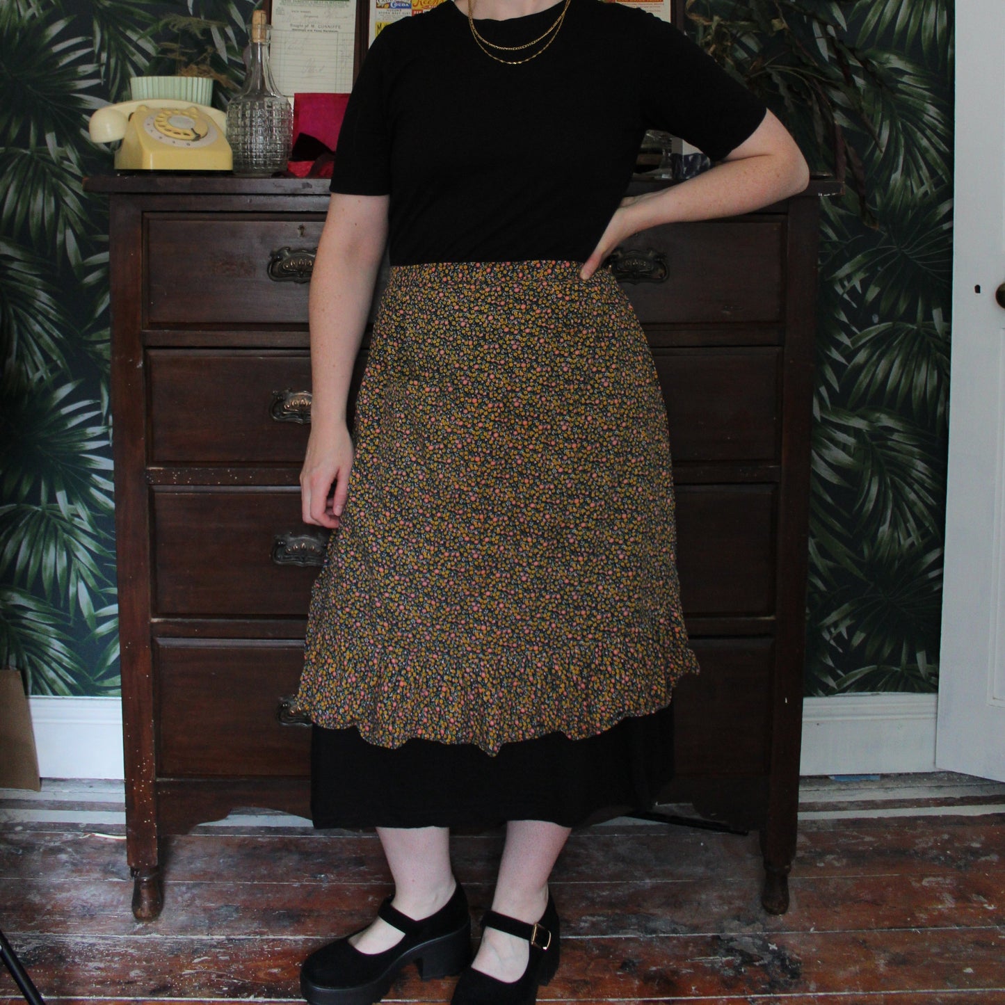 Navy half apron with yellow and blush flowers