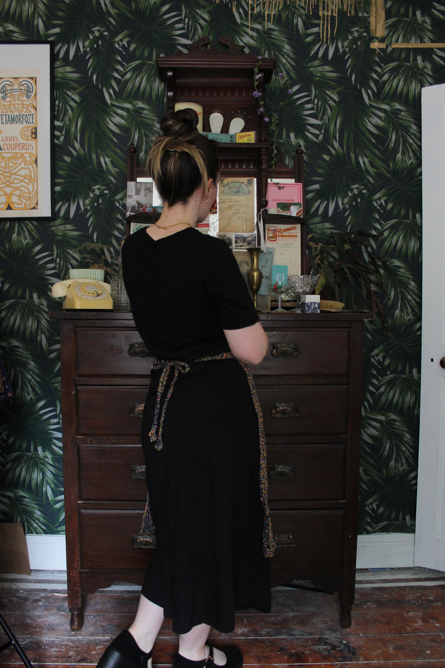 Navy half apron with yellow and blush flowers