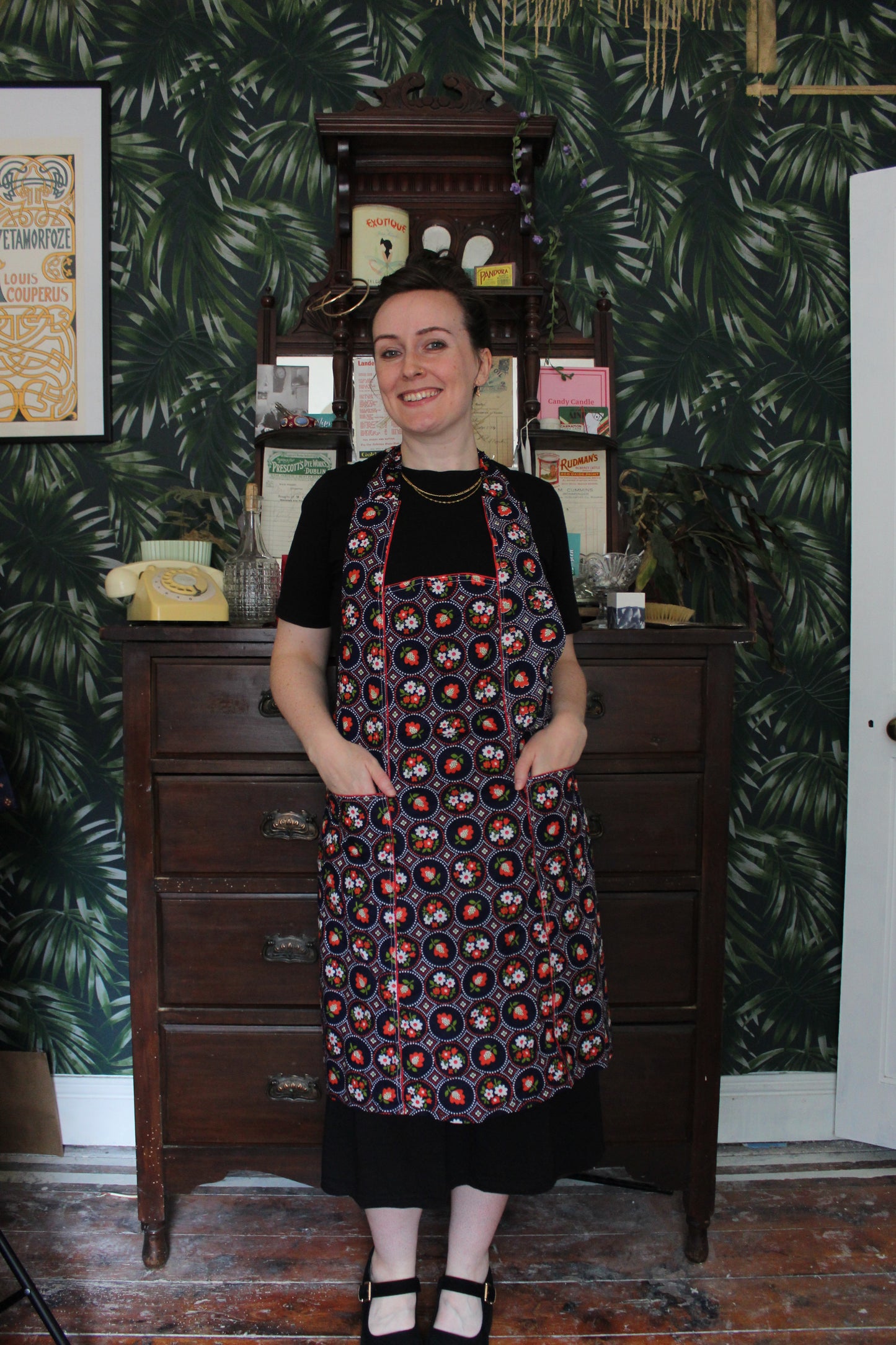 Navy-indigo apron with red posy pattern