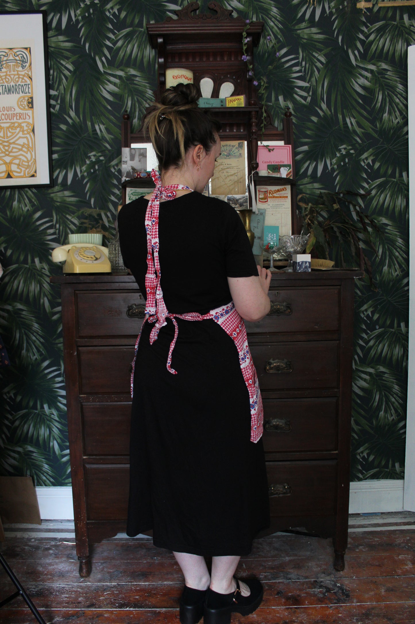 Red and white check apron with blue flowers