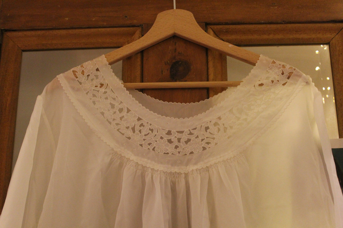 Crisp white nightgown with embroidered neckline