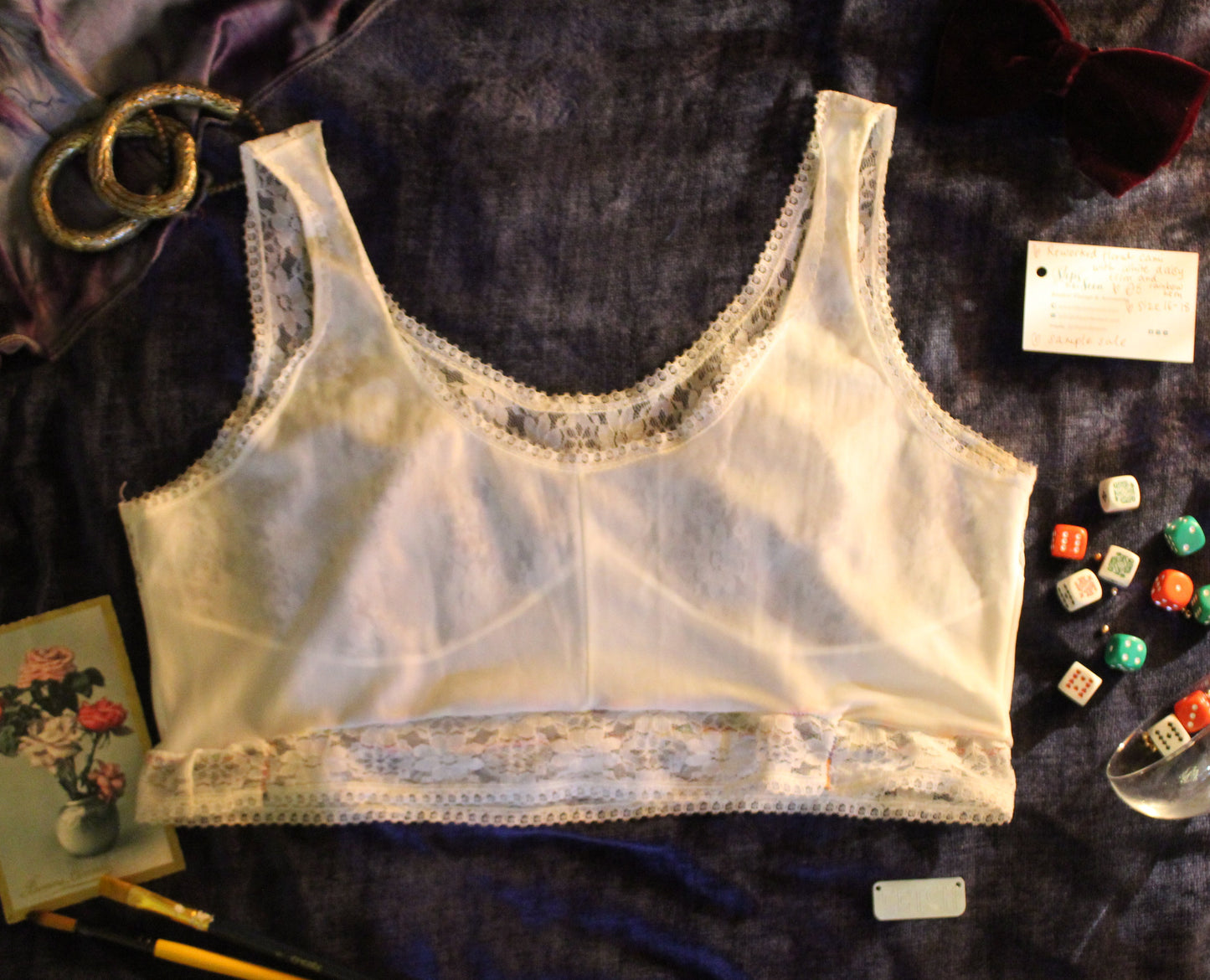 Reworked floral cami with white daisy trim and rainbow hem