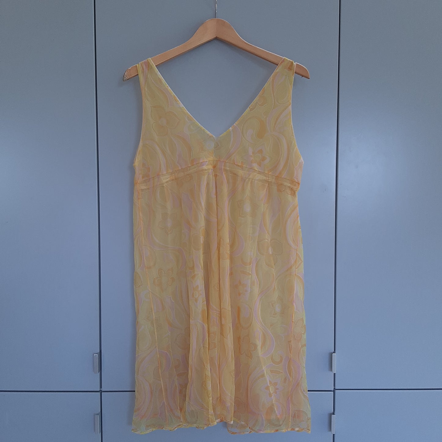 Groovy yellow slip with pink floral pattern
