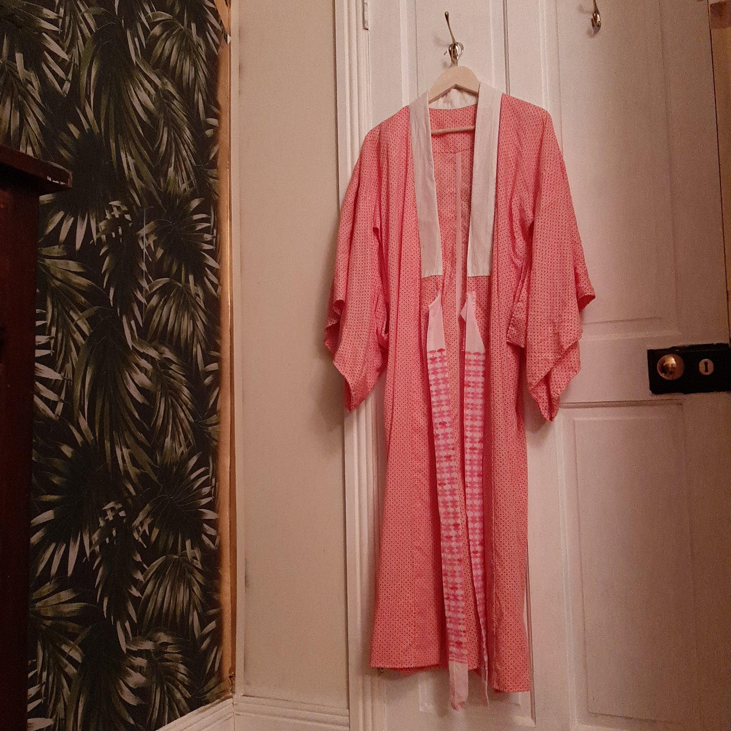 White robe with electric pink XO