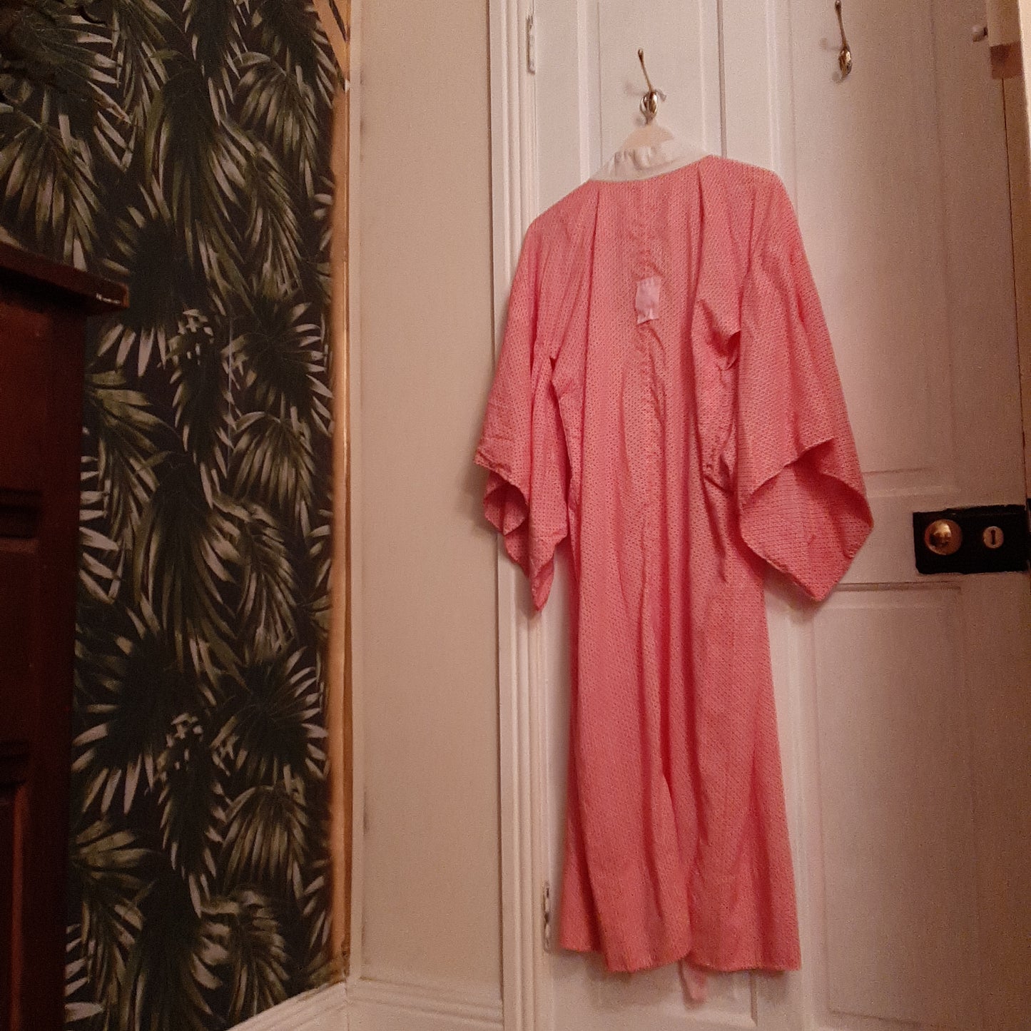 White robe with electric pink XO