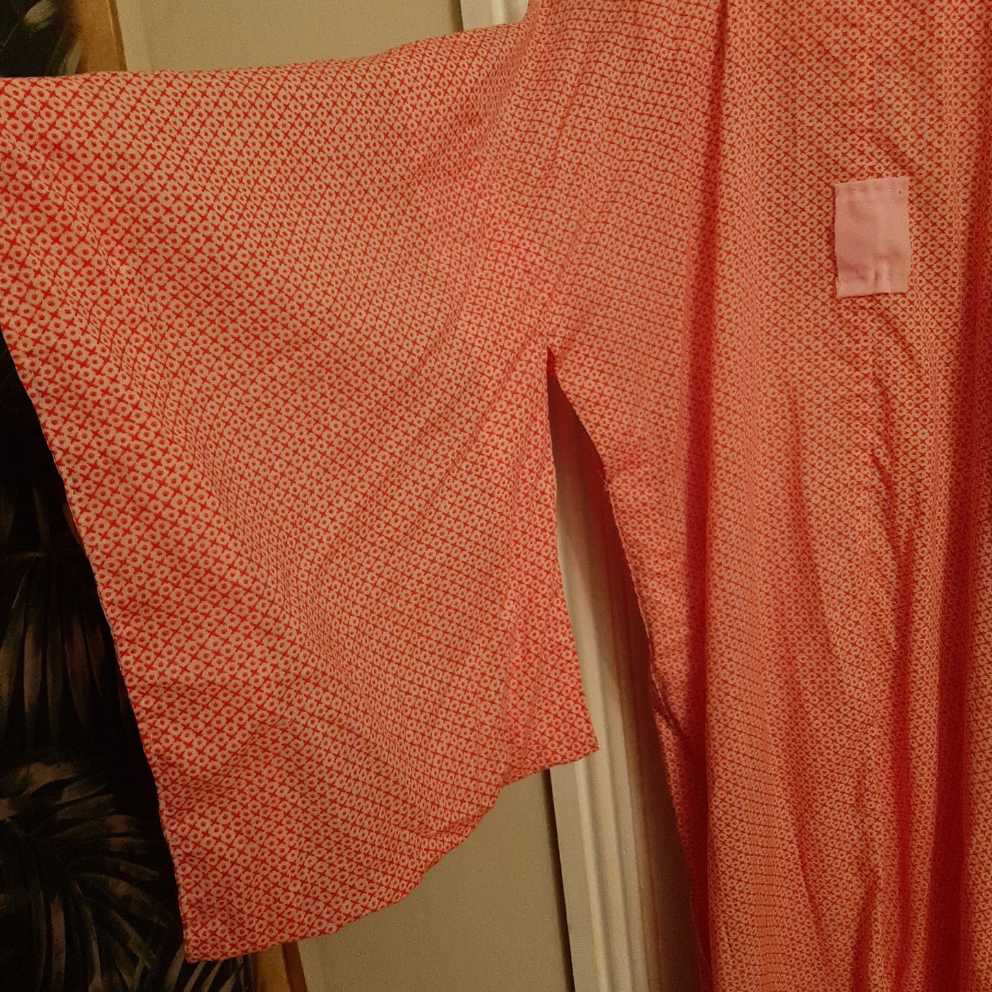 White robe with electric pink XO