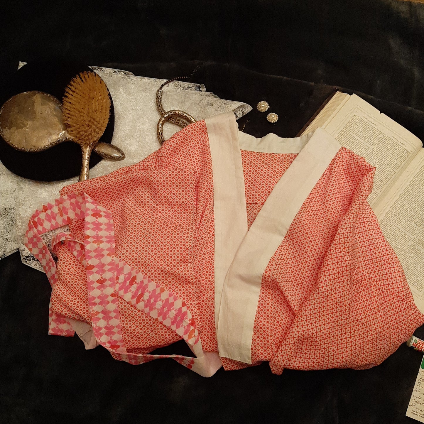 White robe with electric pink XO