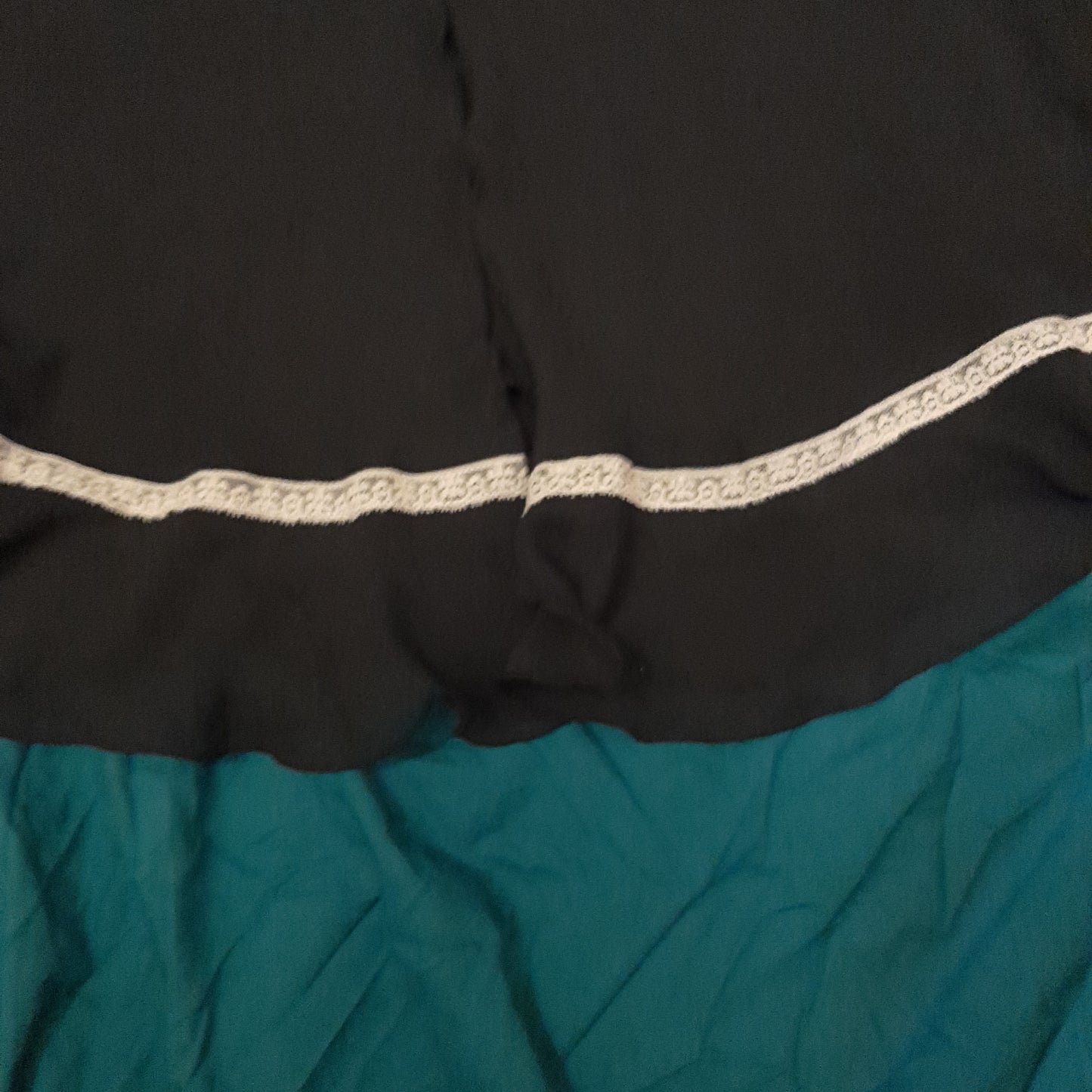 Black slip with white floral detail