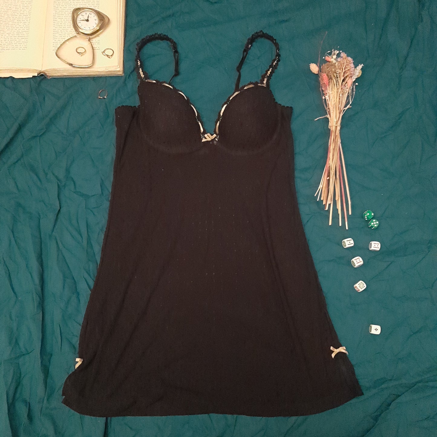 Black slip with dappled pattern and pink ribbon