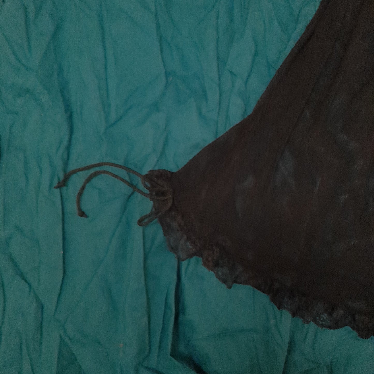 Black net slip with pink tones