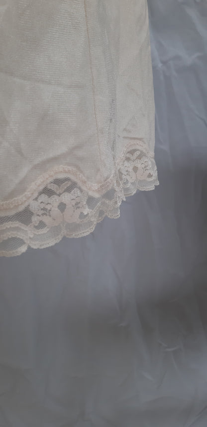 Champagne slip with lace panelling and loop trim