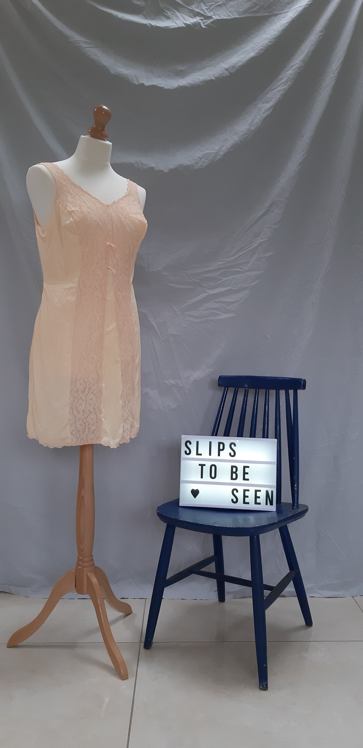 Peach slip with double lace panels