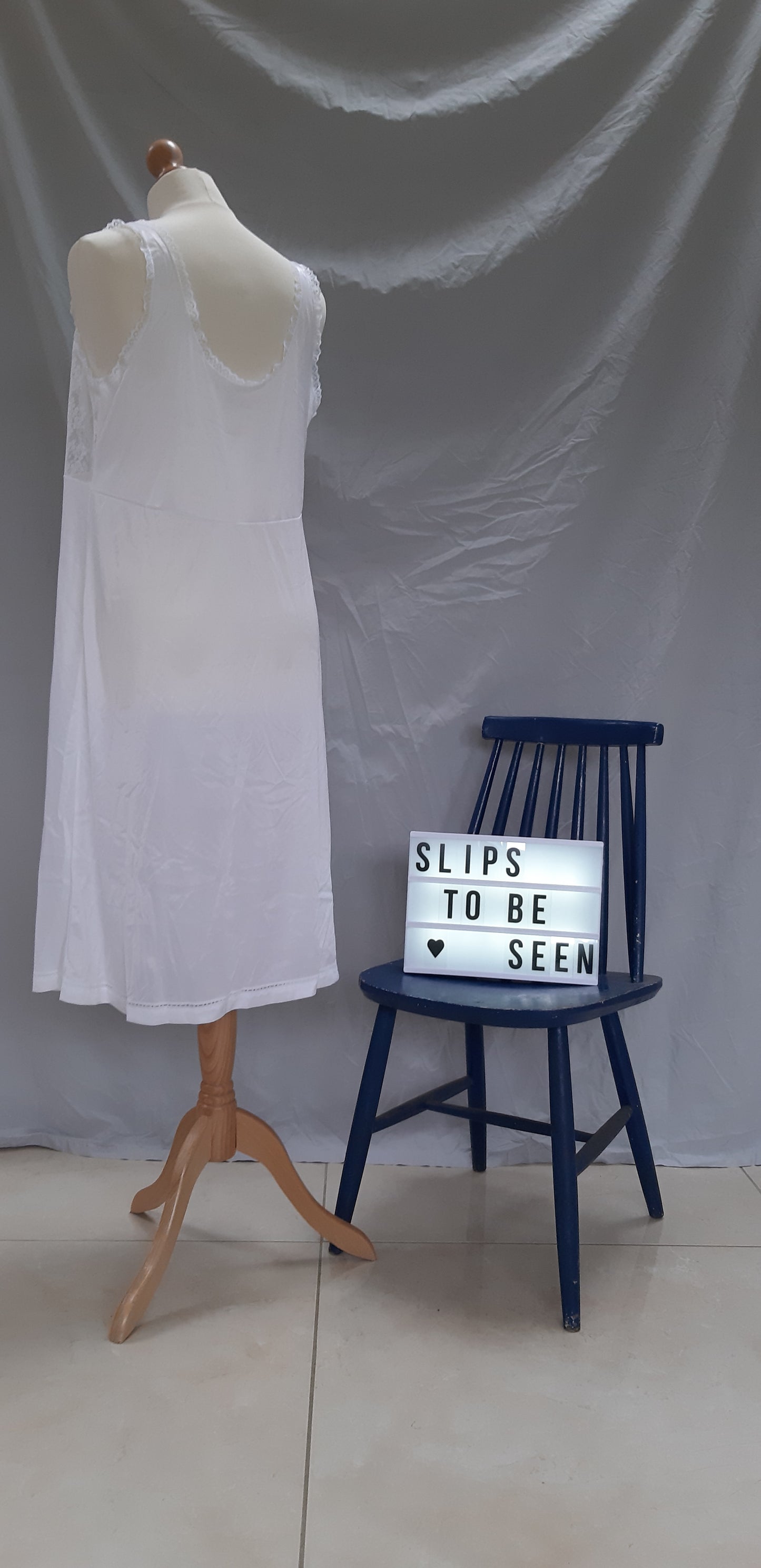 White slip with green floral detail