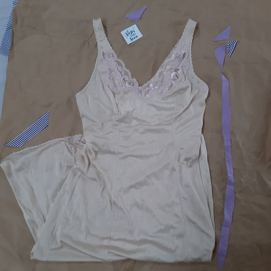 Champagne slip with pink lace detail and loop shape trim