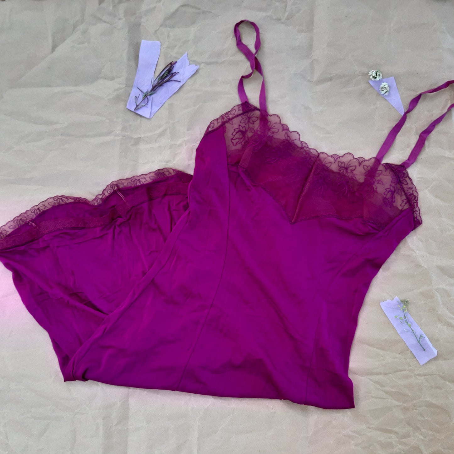 Fuschia slip with floral panels and lettuce edged trim