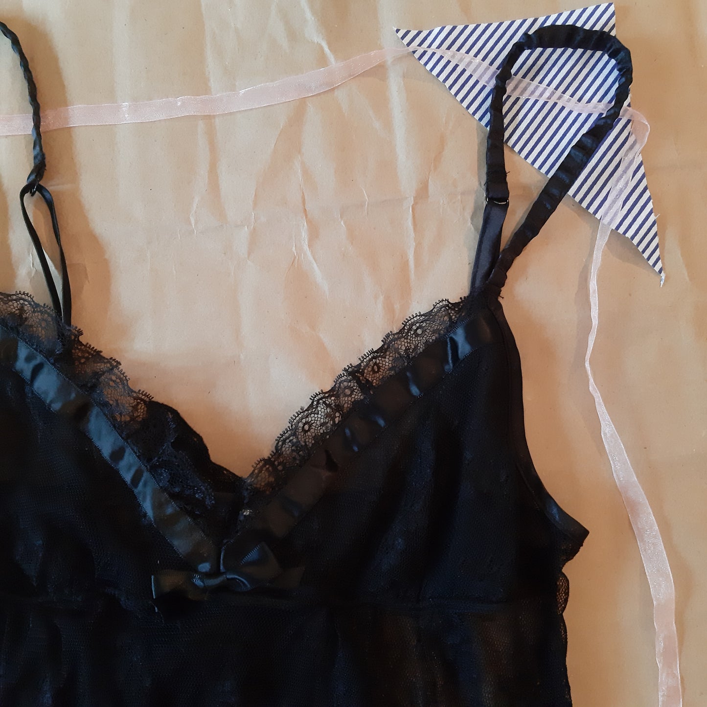 Sheer black slip with floral pattern