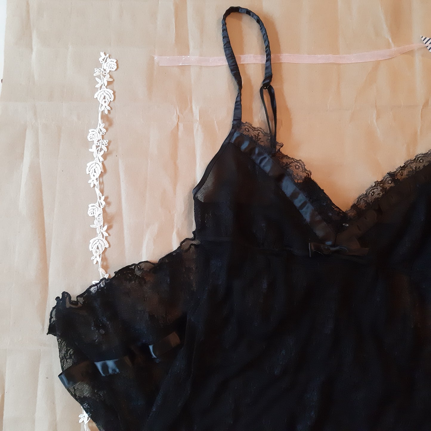 Sheer black slip with floral pattern