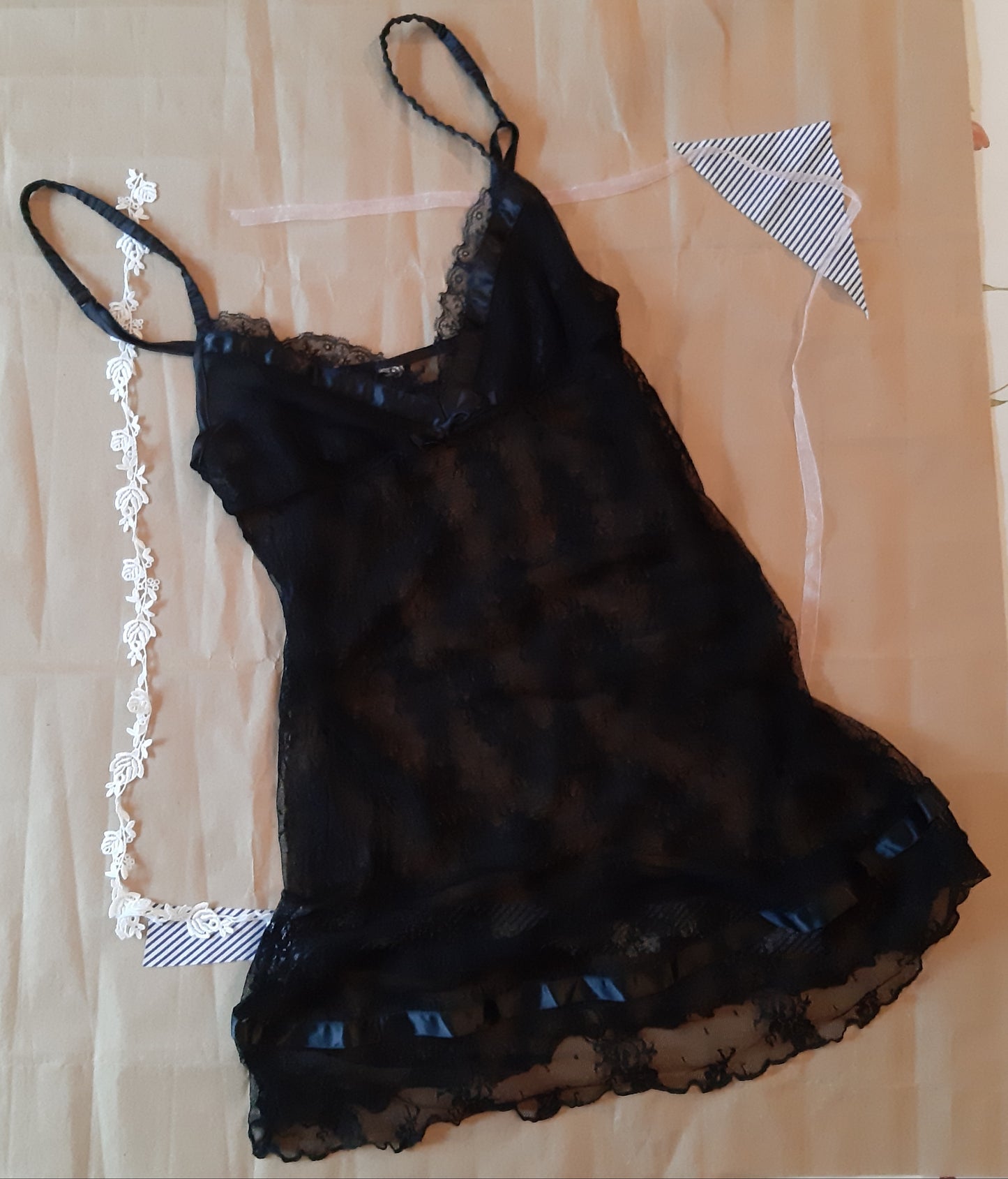 Sheer black slip with floral pattern