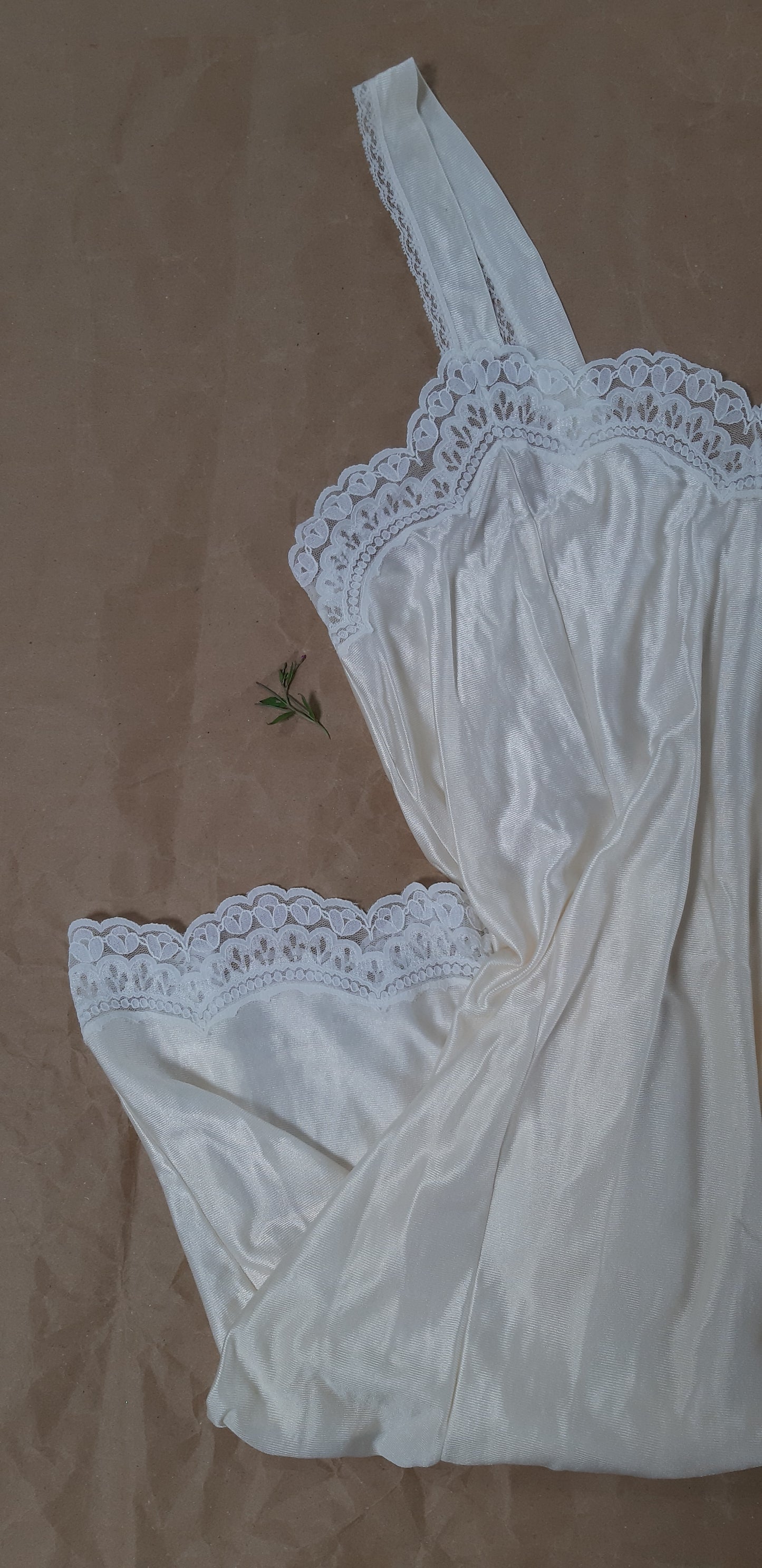 Champagne slip with white floral trim