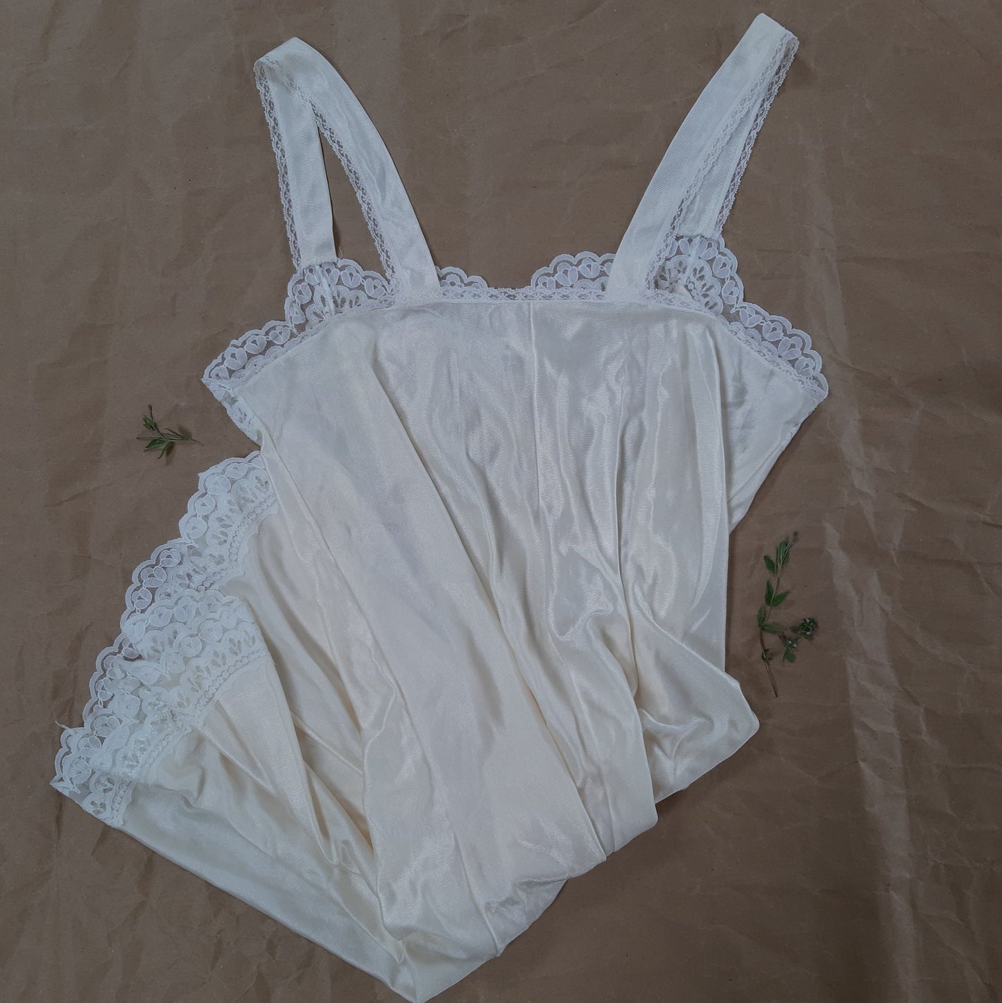 Champagne slip with white floral trim