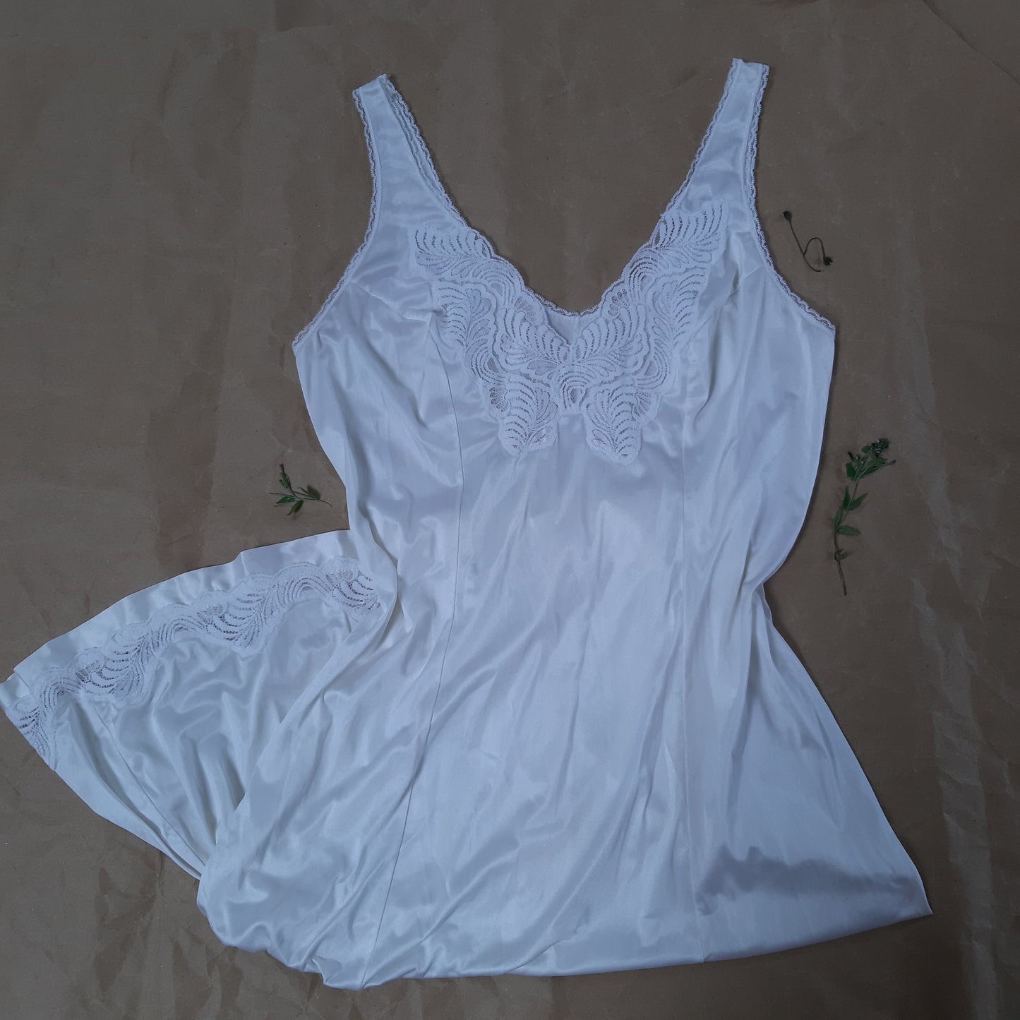 White slip with fern pattern trim