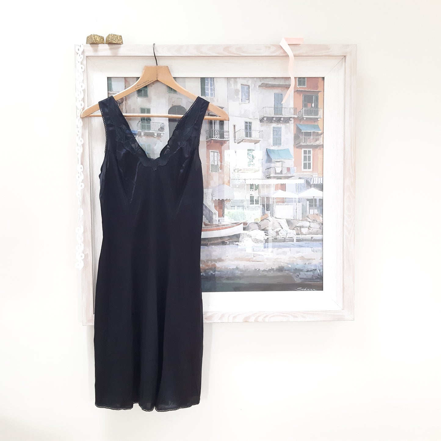 Black slip with woven floral trim