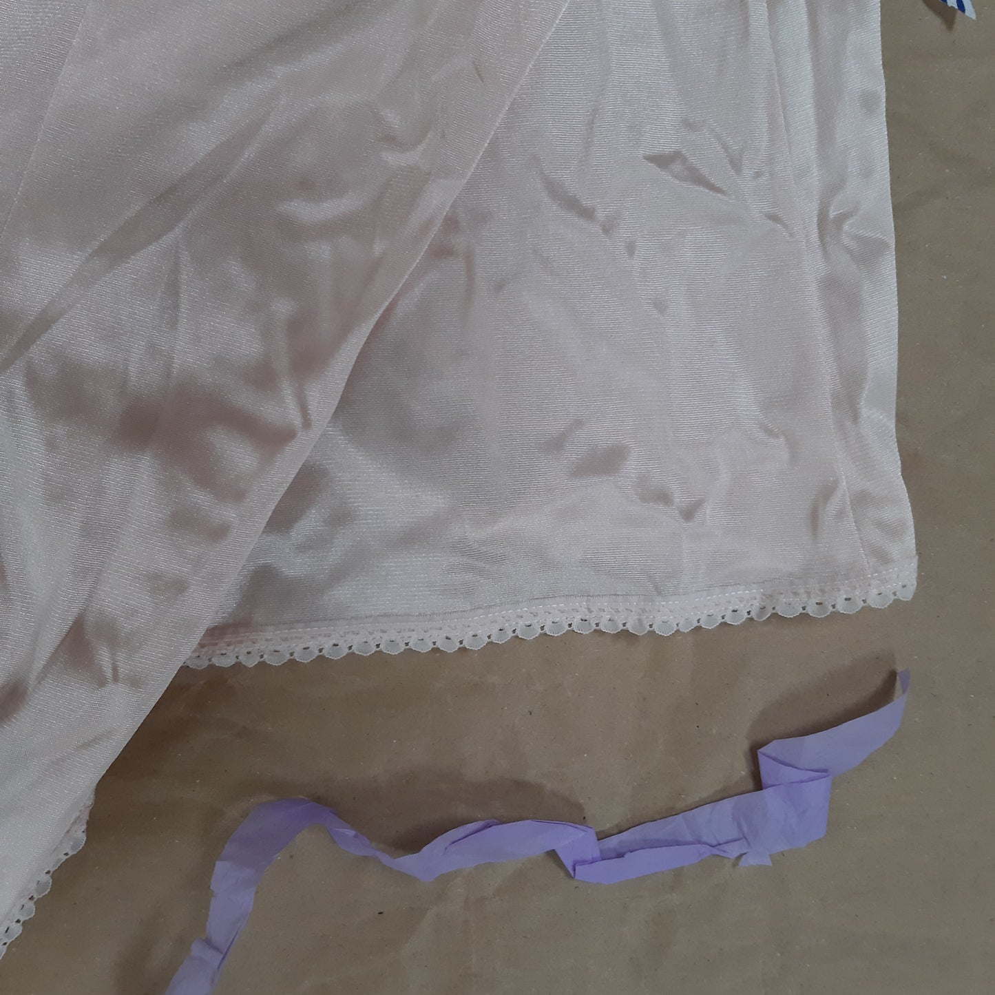 French pink slip with rose trim