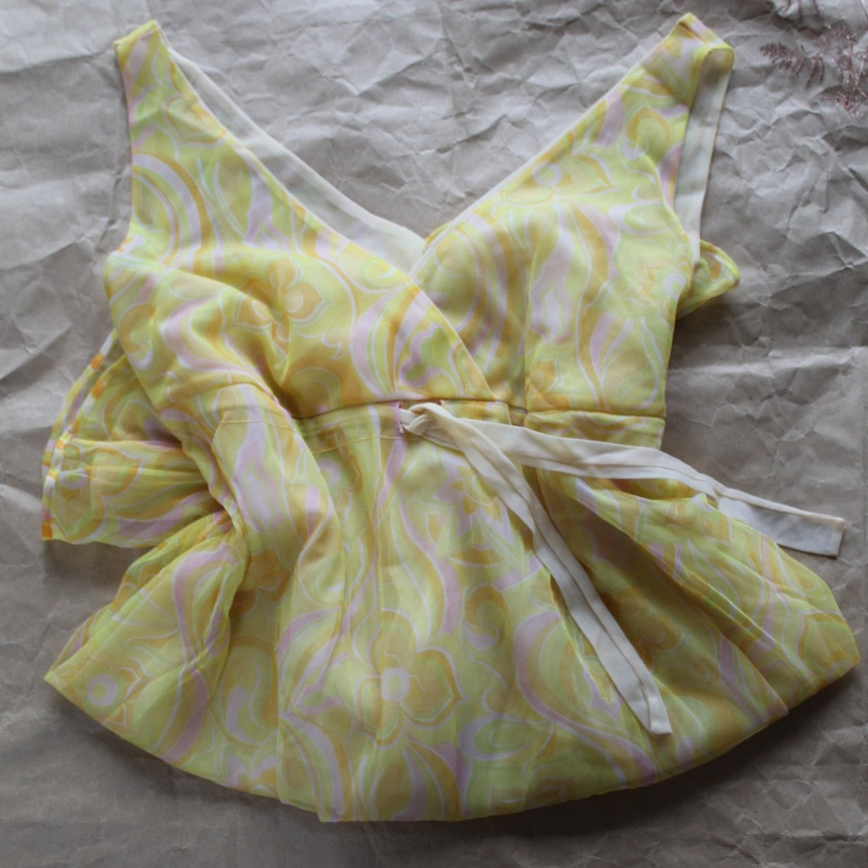 Groovy yellow slip with pink floral pattern
