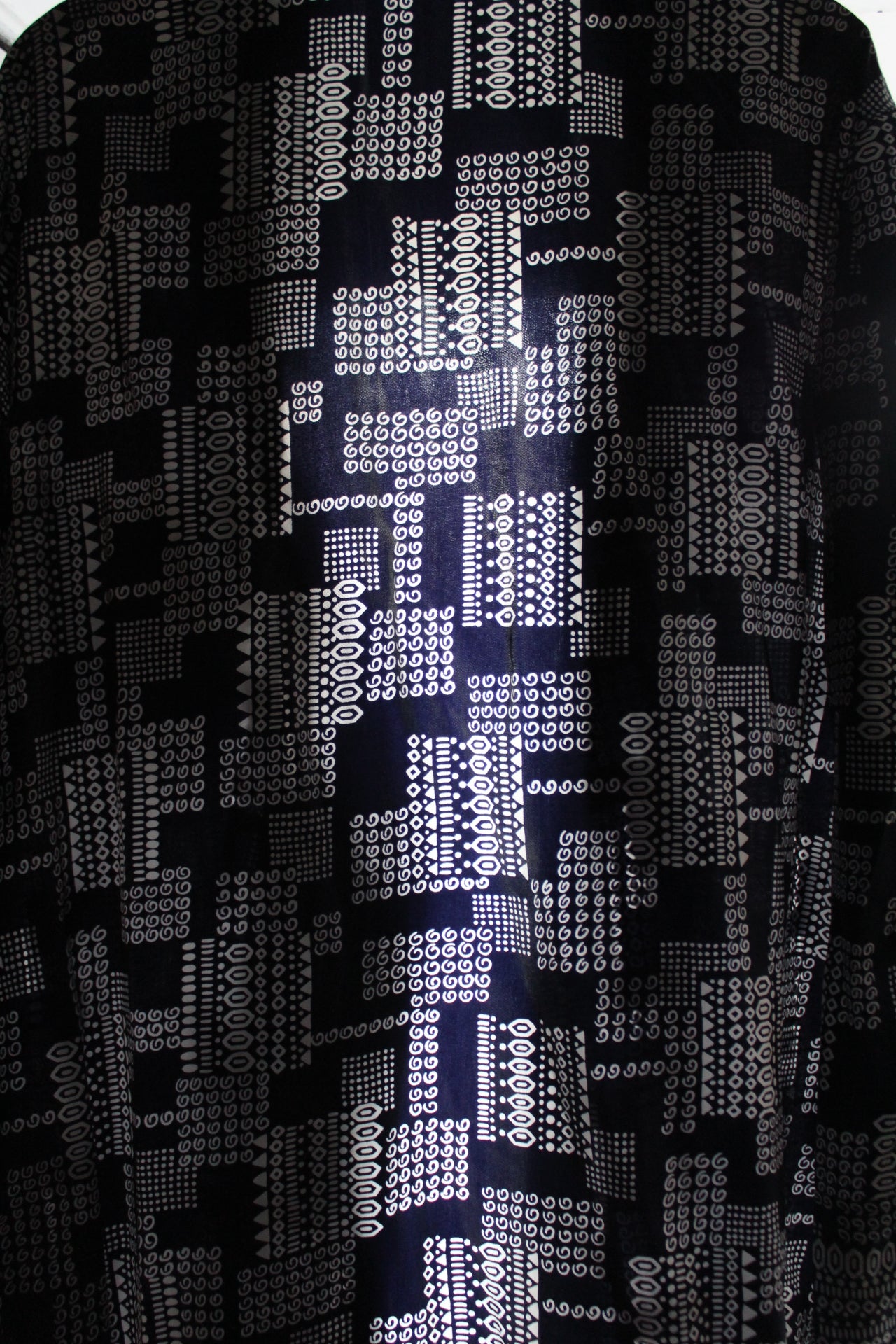 Navy robe with white embellishments