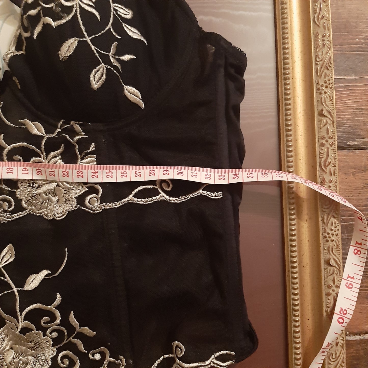 Floral embroidered black top