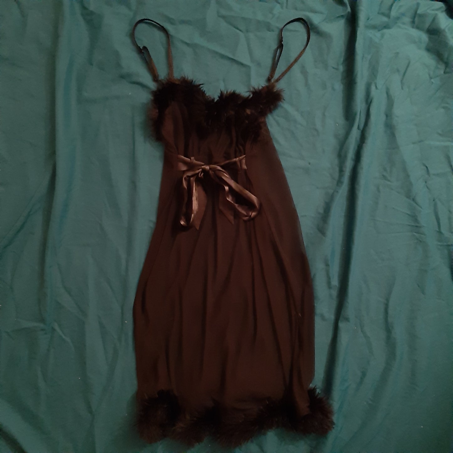 Black slip with feather detail