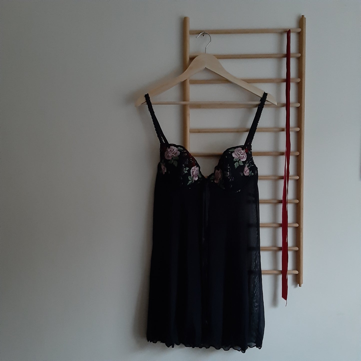 Black slip with embroidered florals