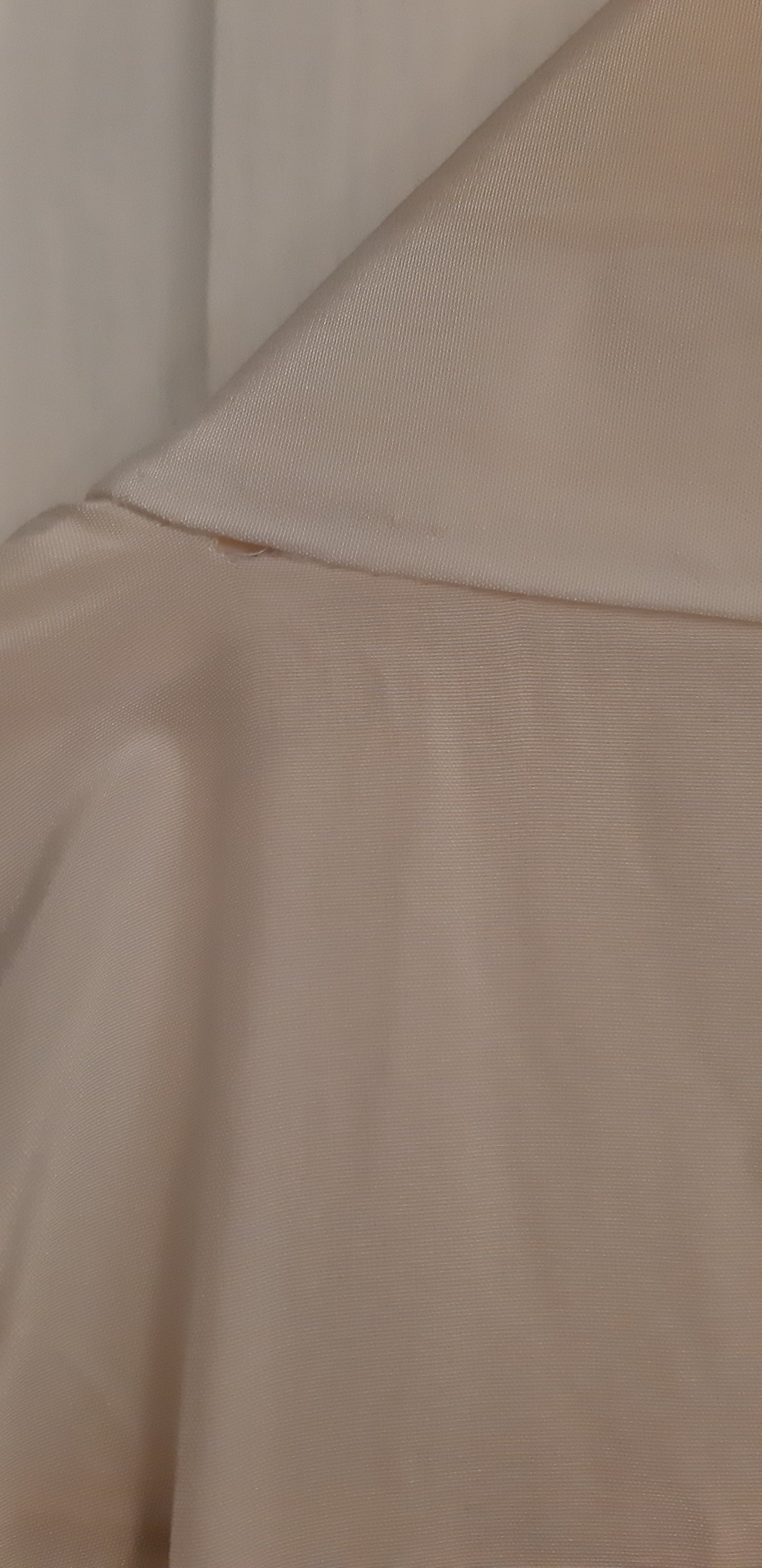 White robe with pink belt