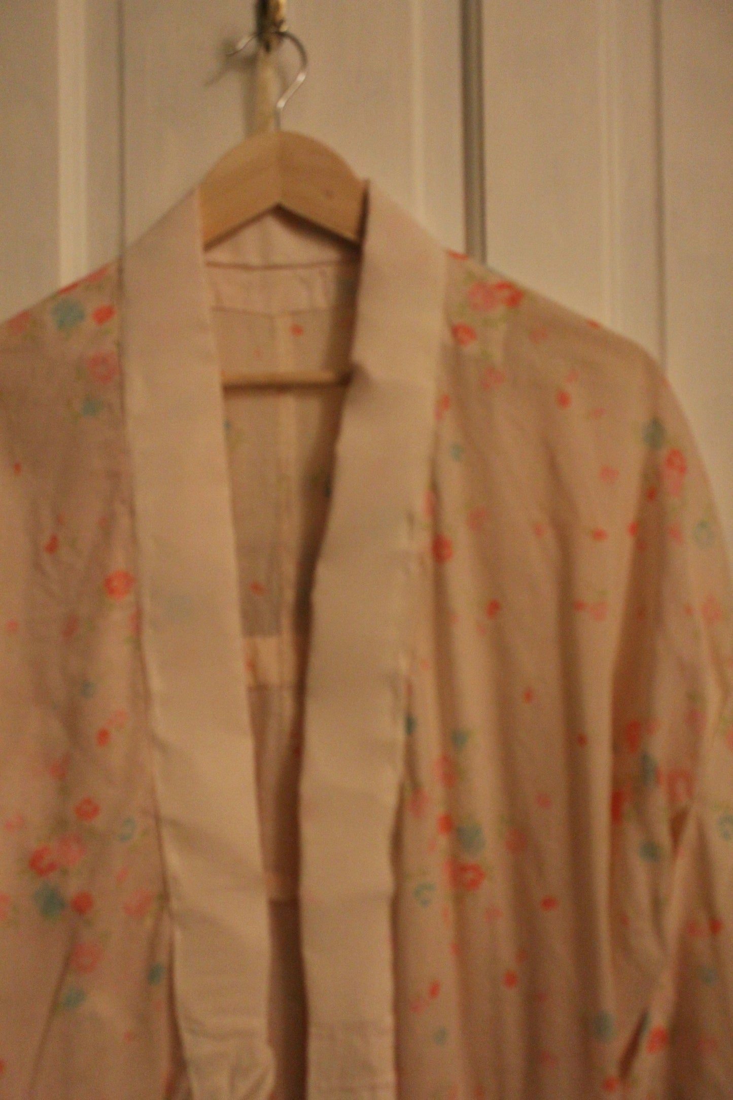 White robe with electric florals