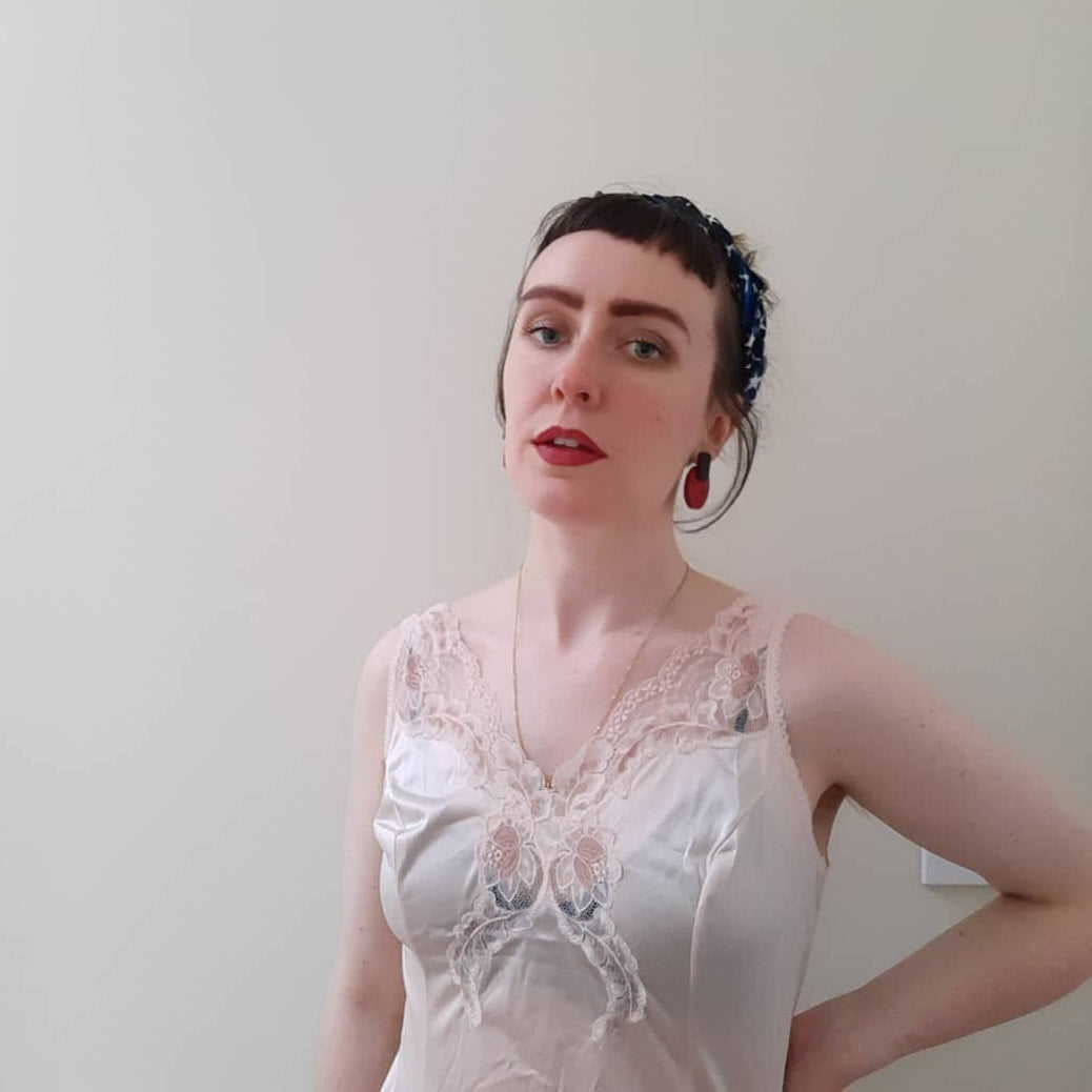 French pink slip with rose trim