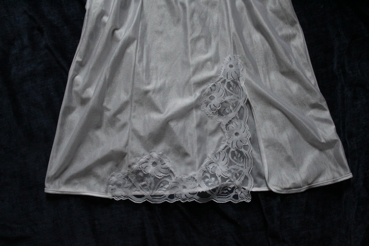 White slip with leg peek