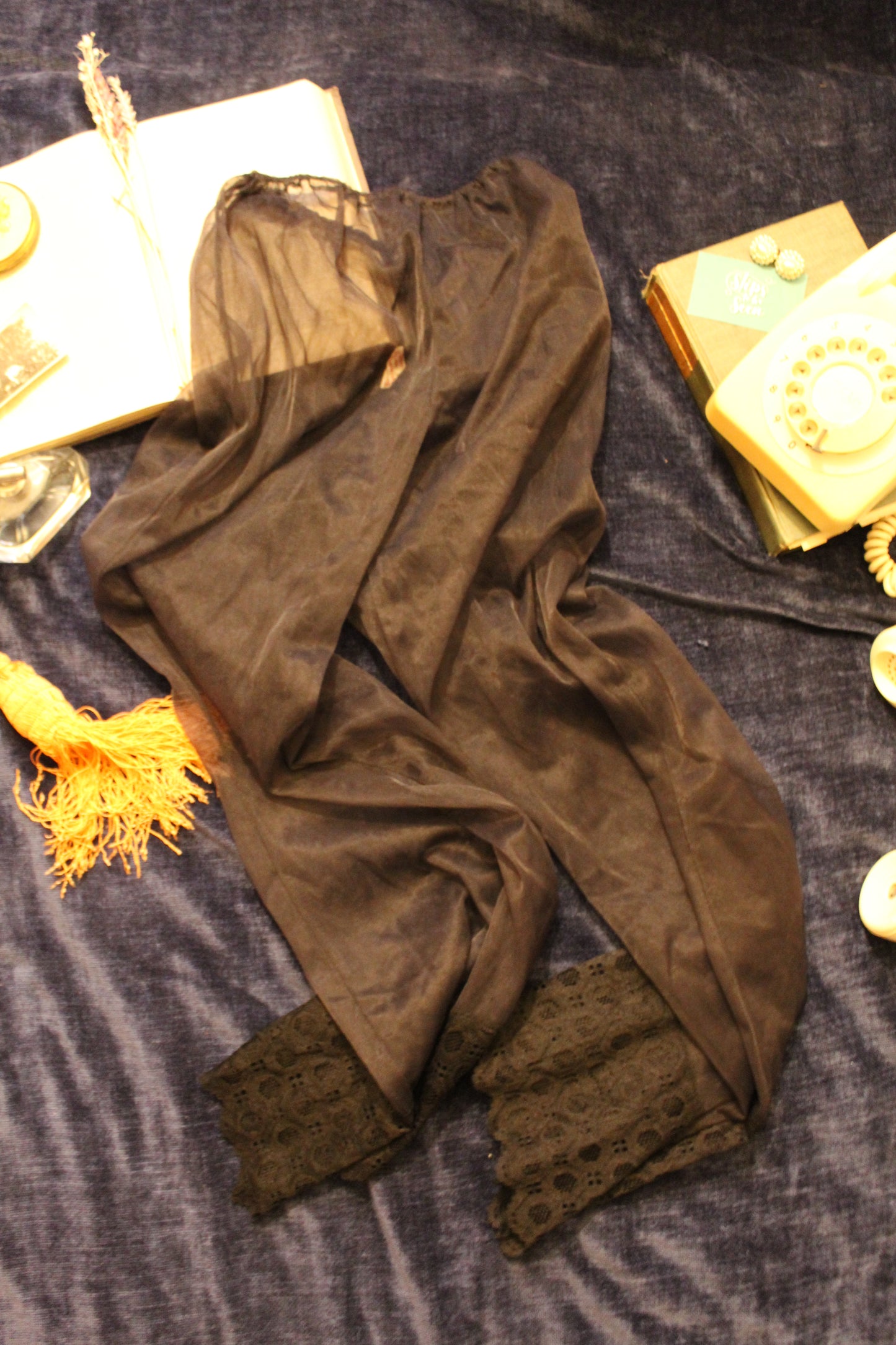 Sheer black pyjama trousers with lace trim