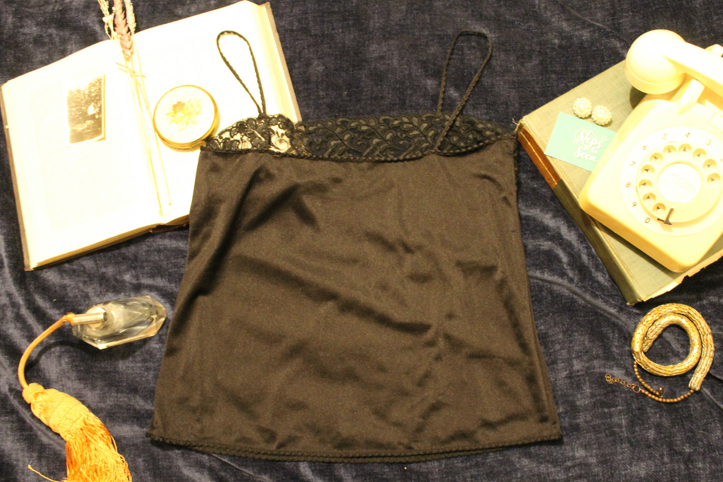 Black top with braided straps