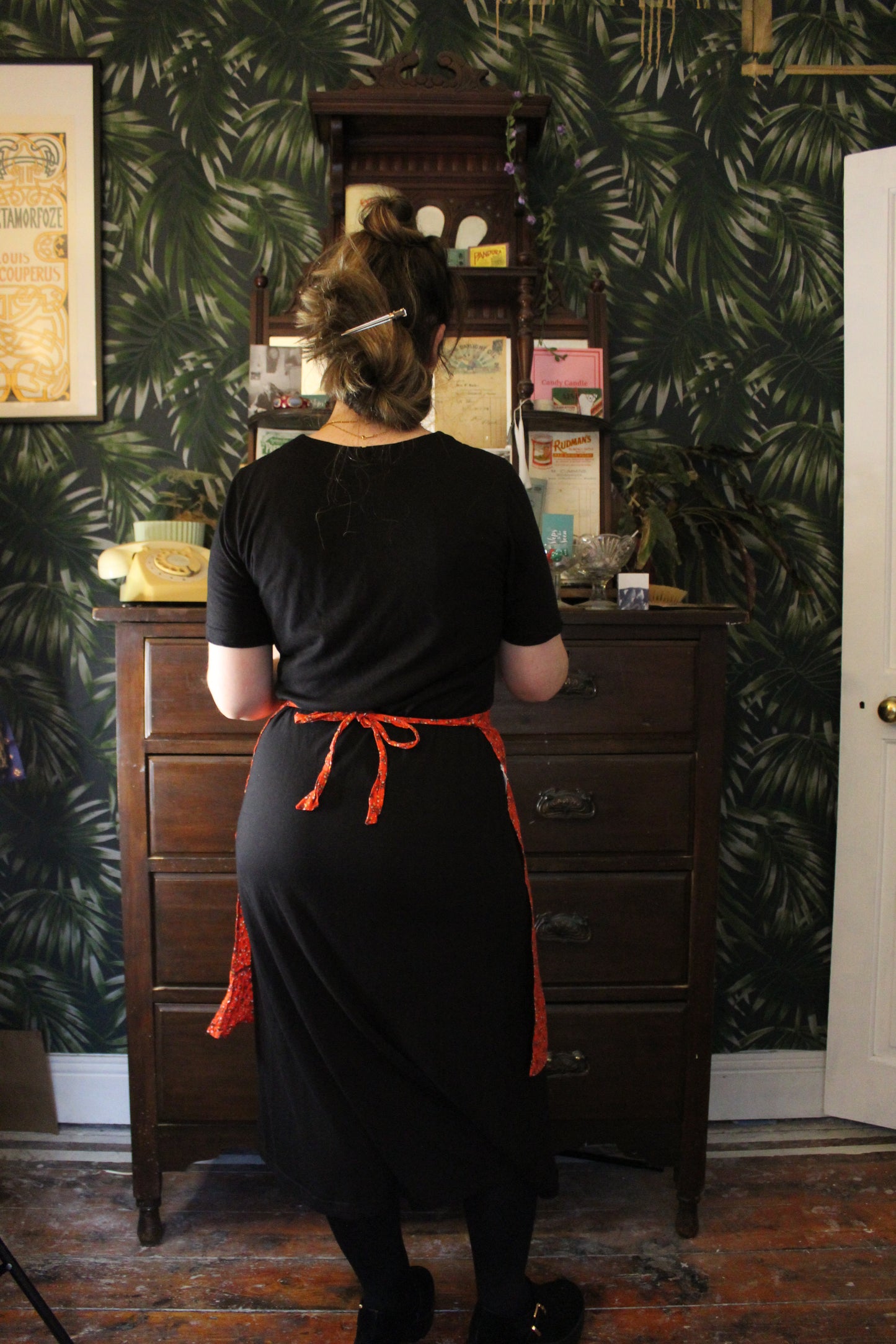 Ruby red half apron with floral print