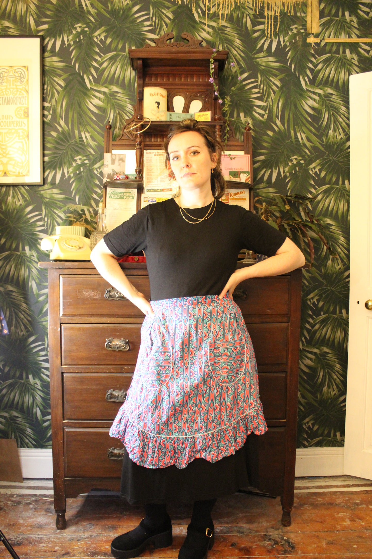 Electric half apron with pink and green geometric print