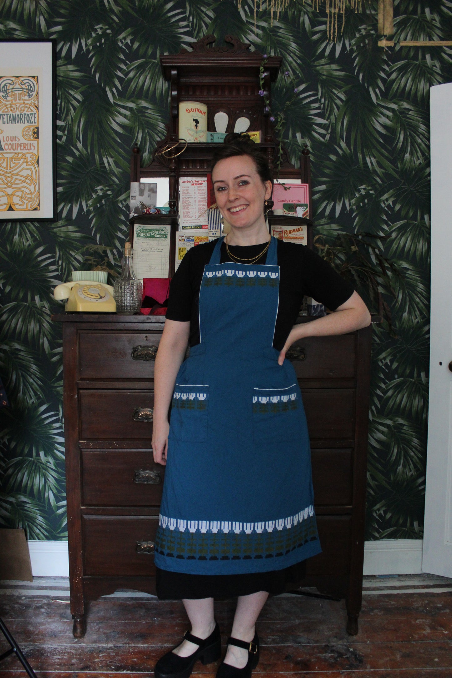 Dark ocean apron with white, juniper and navy embroidery