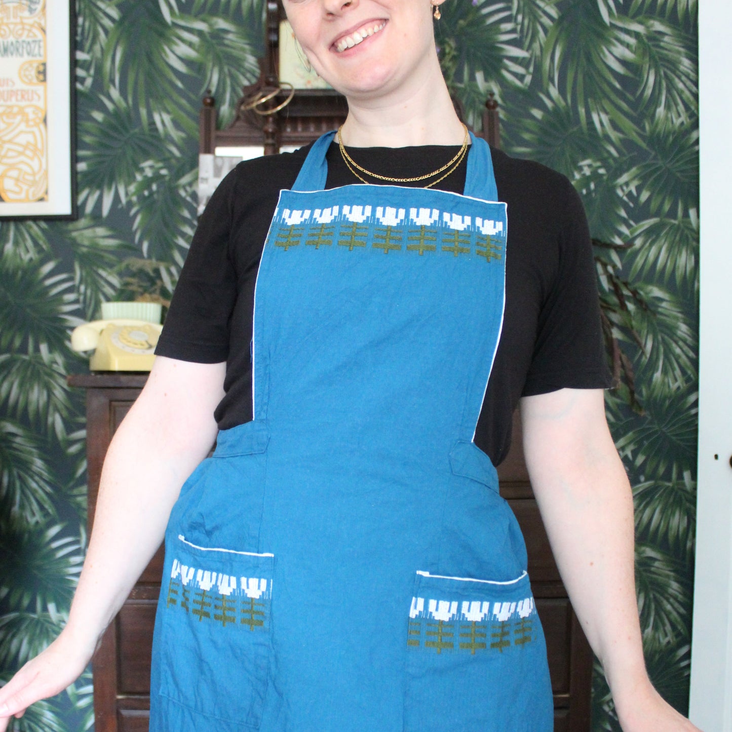 Dark ocean apron with white, juniper and navy embroidery