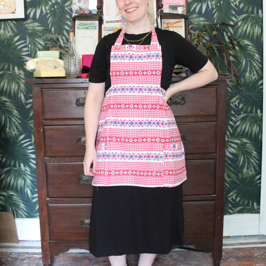 Red and white check apron with blue flowers
