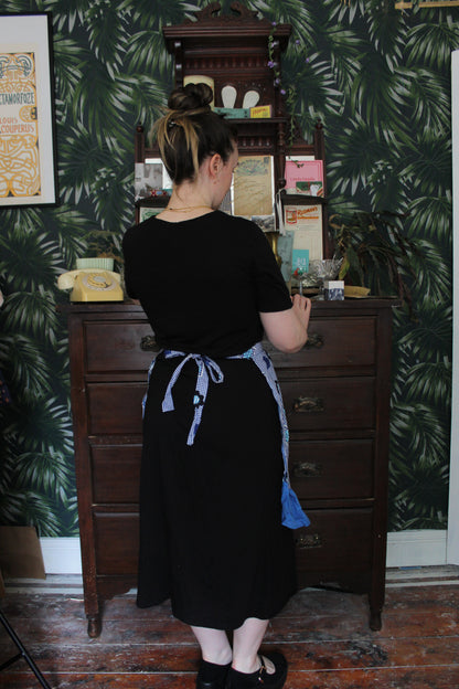 Blue check half apron with flower pattern